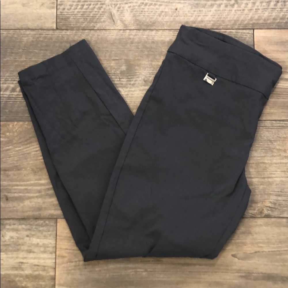 Grey colored tummy-control trouser pants.